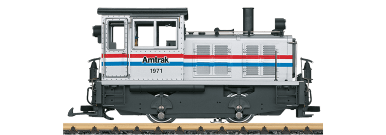 1971 Amtrak locomotive model with white, red and blue livery on transparent background